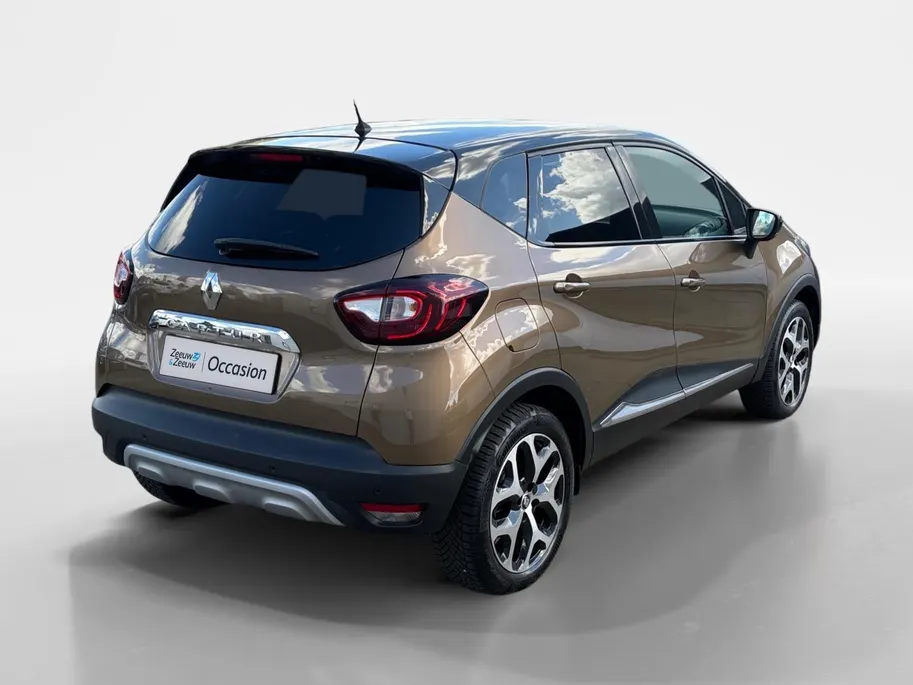 Renault Captur 90PK TCe Intens | All Season Banden | Armsteun | Navi | Camera | Parkeersensoren | Climate Control | Bluetooth | Lichtmetalen Velgen | Licht & Regen Sensor |