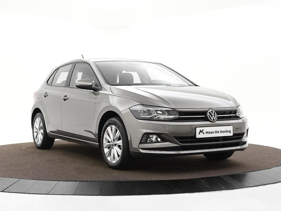 Volkswagen Polo 1.0 TSI 95pk Highline · Apple/Android Car Play · Navigatie · Clima · 16'Velgen · Sportstoelen · Draadloze Telefoonlader ·