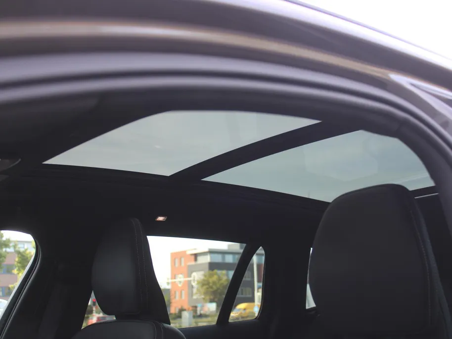 Volvo V60 2.0 T6 Plug-in hybrid AWD Plus Dark | Nappaleder | Trekhaak | HK audio | Schuifdak | Stuur-/stoelverwarming | Adap. Cruise | Dodehoek detectie | Geheugenstoelen | 360 Camera |