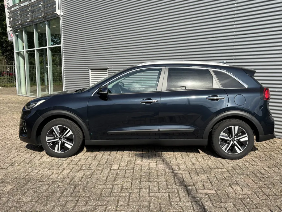 Kia Niro 1.6 GDi Hybrid DynamicPlusLine AUTOMAAT | Trekhaak | Stoel/Stuur verwarming | Adaptieve Cruise | Groot scherm Navigatie | Digitaal cockpit | Apple Carplay/Android Auto | Camera | Climate