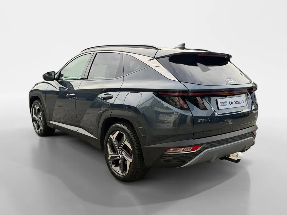 Hyundai Tucson 1.6 T-GDI PHEV Premium Sky 4WD | Zeer compleet | Open dak | Unieke bekleding | Trekhaak | 360 graden camera | Stoel koeling & verwarming |