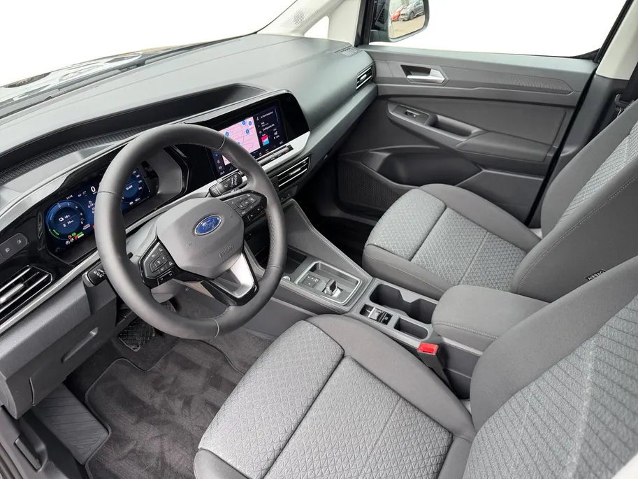 Ford Transit Connect Ford Tourneo Connect PHEV L2 Titanium 7p. | Uit Voorraad Leverbaar | Geel Kenteken | Automaat | Trekhaak | AGR Gecertificeerde Voorstoelen | Achteruitrijcamera | Winter Pakket | Adaptieve Cruise Control