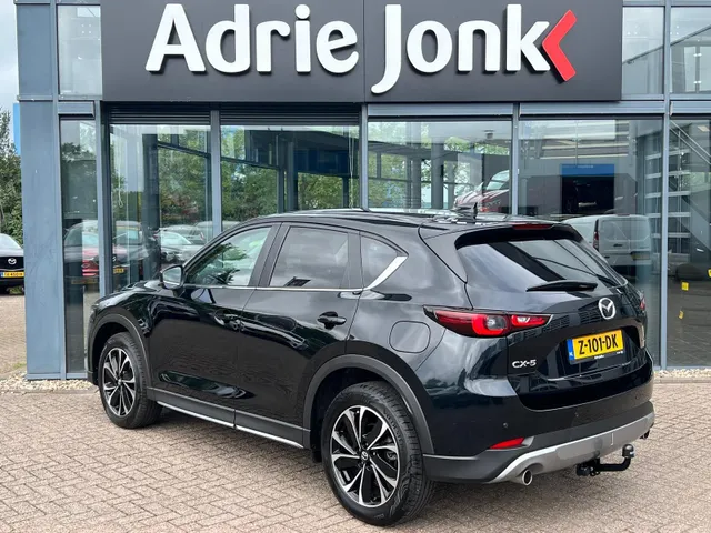Mazda CX-5 2.0 e-SkyActiv-G M Hybrid 165 Newground AUTOMAAT | TREKHAAK | 360gr. CAMERA | NAVIGATIE | APPLE + ANDROID | HEAD-UP DISPLAY | 19'LM VELGEN | EL.A. KLEP |