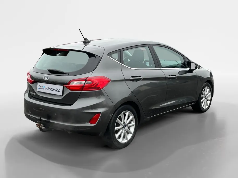 Ford Fiesta 1.0 EcoBoost Titanium Automaat | NL auto | Dealer onderhouden | Trekhaak | Winter Pack | Parkeersensoren voor en achter | Achteruitrijcamera | Cruise control | Apple carplay & Android auto | 16' lichtmetalen velgen | Bovag garantie |