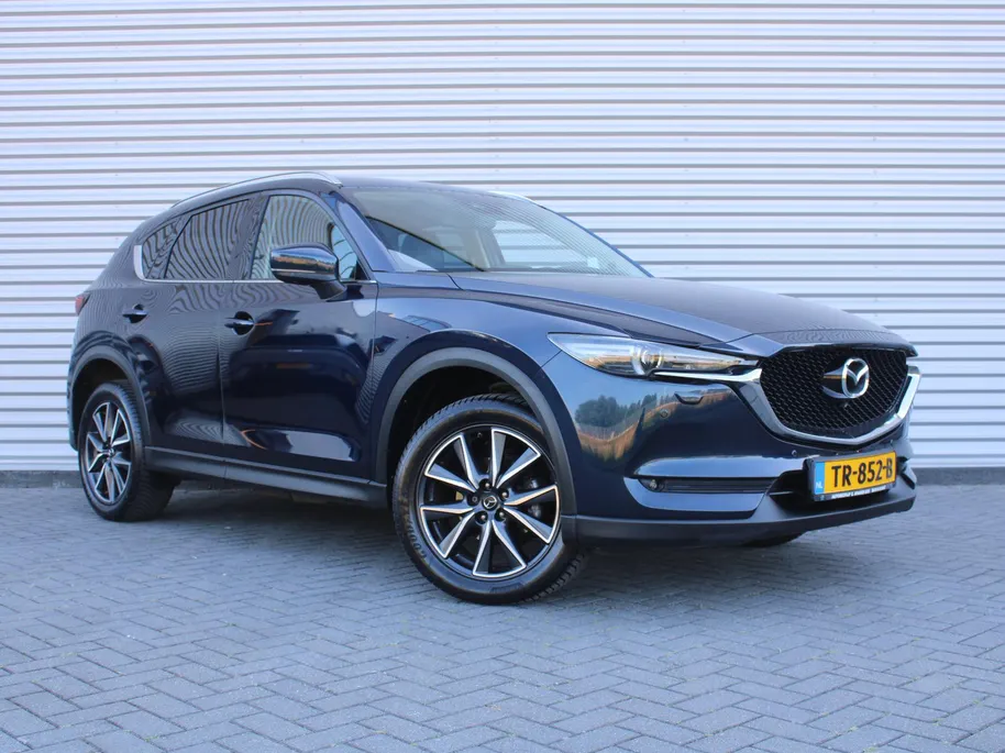 Mazda CX-5 2.0 SkyActiv-G 165 Skylease Luxury | Trekhaak | 360 Camera | Leer | Stuur-/stoelverwarming | HUD | Bose | Elek. stoelverstelling | 19' LM | All seasons |
