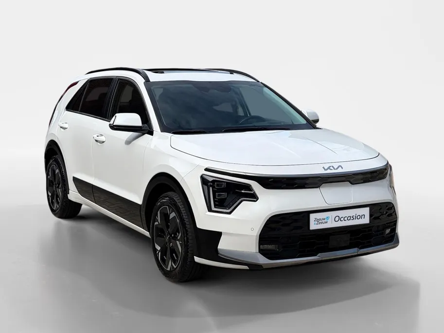 Kia Niro EV DynamicPlusLine 64.8 kWh | Glazen schuif-/kanteldak | Stoel- en stuurverwarming | Elektrisch bedienbare achterklep | Head-up display | Dodehoek assistentie | Achteruitrijcamera | Apple/Android Carplay | LED | Climate control