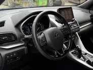 Mitsubishi Eclipse Cross 2.4 PHEV Intense+ | Stoel- en stuurverwarming | Elektrisch verstelbare stoelen | Trekhaak | Achteruitrijcamera | Parkeersensoren voor- en achter | Navi | Climate Control