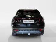 Hyundai Tucson 1.6 T-GDI PHEV Premium Sky 4WD | 66km WLTP elektrisch | Navigatie | Adaptive cruise control | Trekhaak | Apple Carplay & Android Auto | Dode hoek detectie | Draadloze telefoonlader |