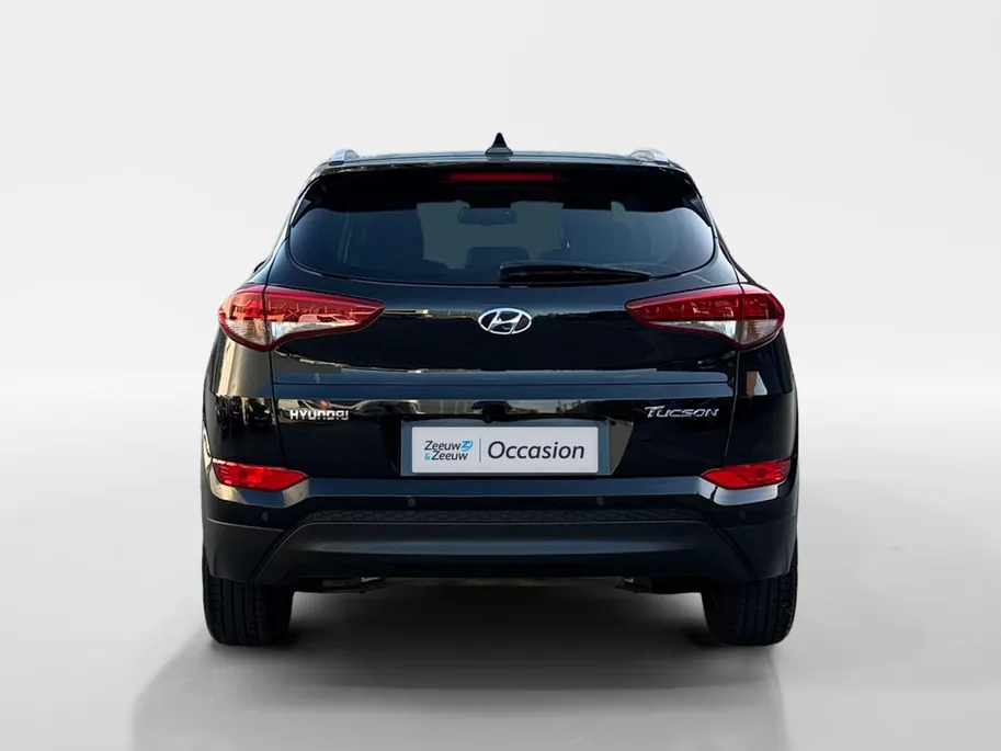 Hyundai Tucson 1.6 GDi Comfort | Elektrisch Verstelbare Stoelen | Navigatie | Bluetooth | Camera | Stoelverwarming | Cruise & Climate Control | Onderhoudshistorie | All Season Banden | 12 Maanden BOVAG Garantie