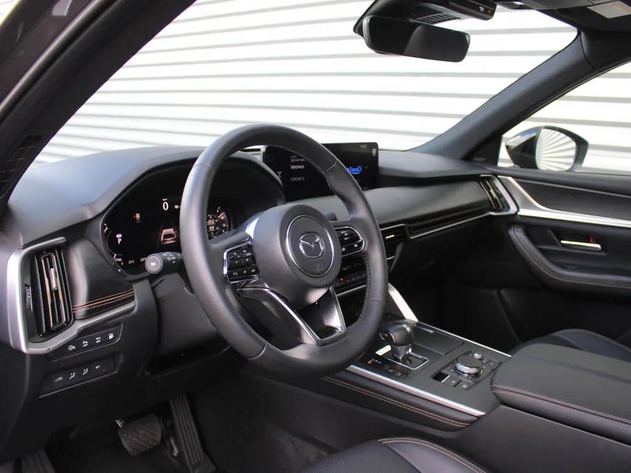 Mazda CX-60 2.5 e-SkyActiv PHEV Homura Plus | Stuur-/stoelverwarming+ventilatie | Schuifdak | Leer | HUD | Elek. stuur-/stoelverstelling | Camera rondom | 20' LM |