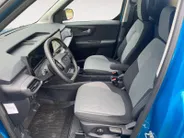 Ford E-Transit Courier Limited 44 kWh 136 pk | DEMO | Adaptive cruise control | Achteruitrij camera | Verdiepte tussenwand | Trekhaak | Navigatie | Direct leverbaar!