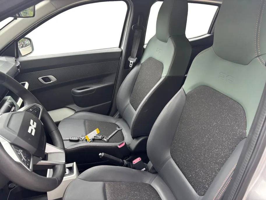 Dacia Spring Extreme 65 26.8 kWh AUTOMAAT NAVI AIRCO CAMERA APPLE CARPLAY ANDROID AUTO PAS 1600KM ZEER MOOIE AUTO GELIJK LEVERBAAR