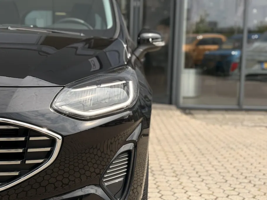 Ford Fiesta 1.0 EcoBoost Hybrid Titanium PARKEERSENSOREN ACHTER I ALL SEASON BANDEN I APPLE CARPLAY / ANDROID AUTO I