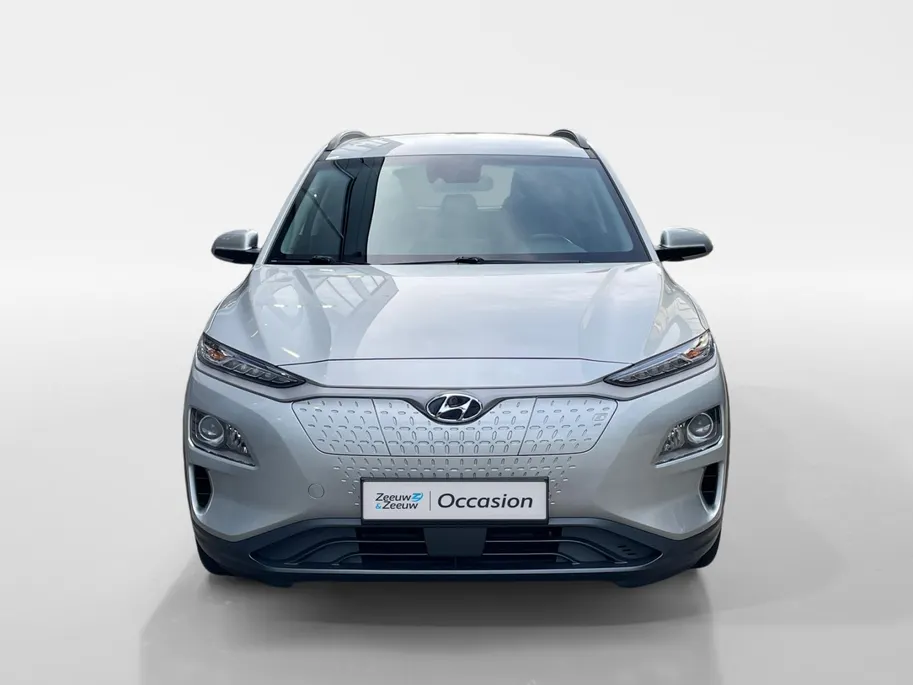 Hyundai Kona EV Comfort 64 kWh 204PK | Warmtepomp | 100% SOH | Adaptive cruise control | Apple Carplay & Android Auto | Achteruitrijcamera | Parkeersensoren achter | Keyless entry | DAB radio |