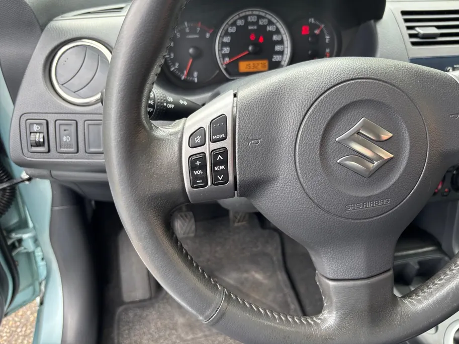 Suzuki Swift 1.3 Shogun | Trekhaak | Airco | 12 maanden garantie | Lichtmetalen velgen | Radio/CD Speler