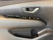 Hyundai Tucson 1.6 T-GDI PHEV Premium Sky 4WD | 66km WLTP elektrisch | Navigatie | Adaptive cruise control | Trekhaak | Apple Carplay & Android Auto | Dode hoek detectie | Draadloze telefoonlader |