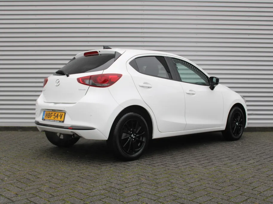 Mazda 2 1.5 e-SkyActiv-G 90PK 6MT Homura | Stuur-/stoelverwarming | Camera | Dodehoek detectie | LED | 16' LM | Carplay | Clima | Cruise |
