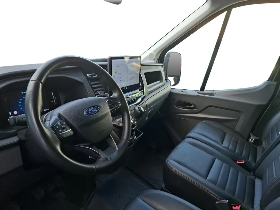 Ford Transit 350 2.0 TDCI L3H2 Trail 165 pk handgeschakeld | BPM VRIJ | Adaptive Cruise control | Navigatiesysteem | Raptor Gril | Zwarte treeplanken | LM velgen gloss black | Houten kasten links en rechts | Dakdragers met laddersysteem
