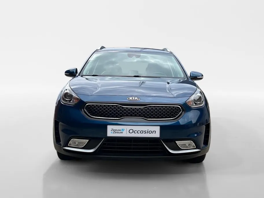Kia Niro 1.6 GDi Hybrid DynamicLine | Trekhaak Vast + 13-Polige Stekker | All-Seasonbanden | Apple Carplay / Android Auto | Navigatiesysteem | Parkeersensoren + Camera Achter | Cruise Control | Rijstrooksensor + Correctie