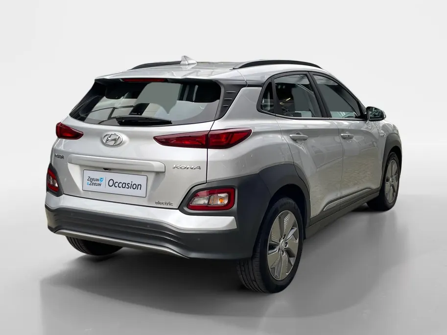 Hyundai Kona EV Comfort 64 kWh | Warmtepomp | 100% SOH | Adaptive cruise control | Apple Carplay & Android Auto | Achteruitrijcamera | Parkeersensoren achter | Keyless entry | DAB radio |