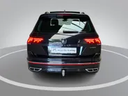 Volkswagen Tiguan 1.4TSIeHybrid 180kW/245PK DSG R-Line · Panoramadak · Trekhaak · 360°Camera + Parkeersensoren · 20'' · Apple/Android Car Play ·