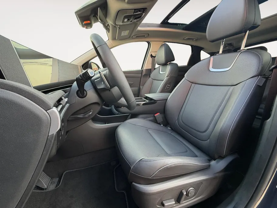 Hyundai Tucson 1.6 T-GDI HEV Premium Sky |Navigatie| Schuif-kanteldak| Lederen bekleding|Stoelverwarming/koeling| elektrisch verstelbare stoelen met geheugen|