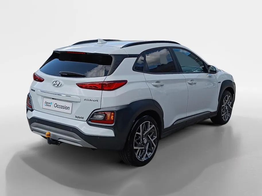 Hyundai Kona 1.6 GDI HEV Premium | Trekhaak | Apple Carplay/Android Auto | Adaptive cruise control | Dodenhoek herkenning | Leren bekleding