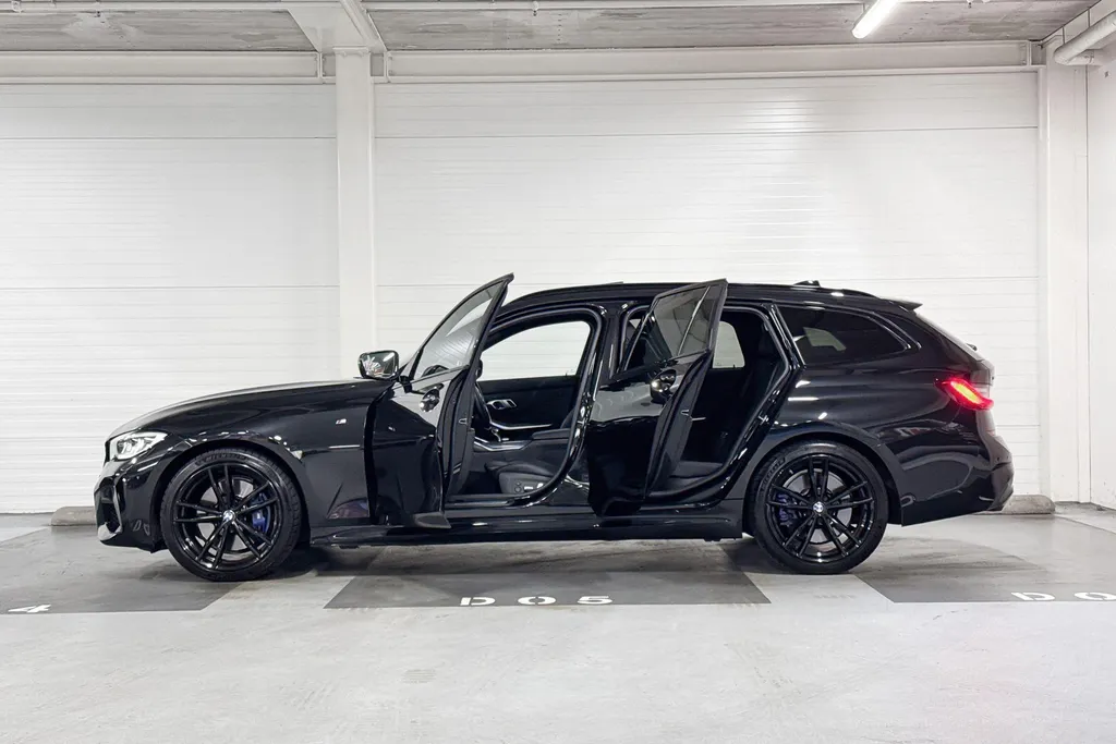 BMW 3 Serie Touring M340i xDrive High Executive