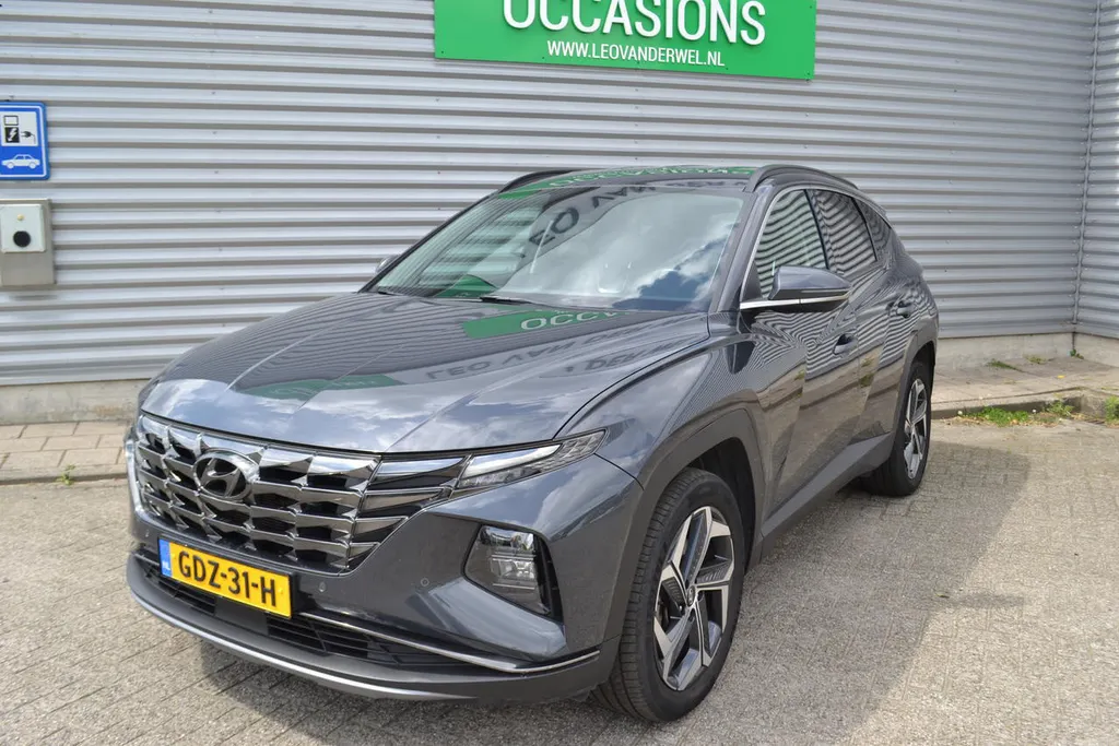 Hyundai Tucson 1.6 HEV PREMIUM|LEER|NAVI|1650KG TREKGEWICHT