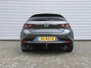 Mazda 3 2.0 e-SkyActiv-G M Hybrid 122 Luxury | Trekhaak | Stuur-/stoelverwarming | Leer | 360 Camera | Stoelgeheugen | 18' LM | HUD | LED | Cruise adapt. |