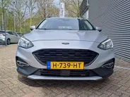 Ford Focus Wagon 1.0 EcoBoost Active Business | Navi | PDC | Cruise | Trekhaak | ECC | Stoel, Stuur, Voorruit verwarming