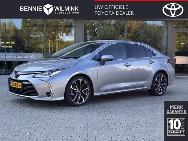 Toyota Corolla 1.8 Hybrid Executive | Leer | All Seasons