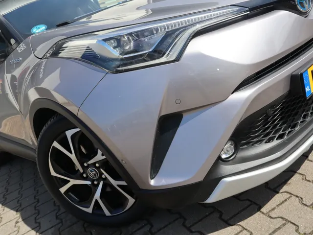 Toyota C-HR 1.8 Hybrid Bi-Tone Trekhaak | Leder | Blindspot | Stoelverwarmin