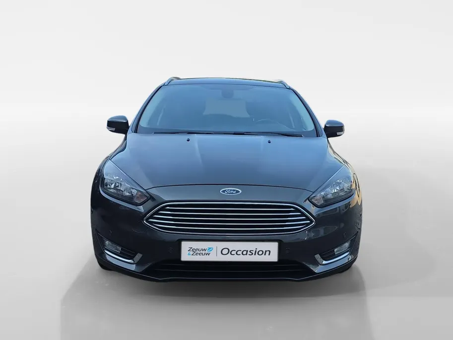 Ford Focus Wagon 1.0 Titanium | Goed onderhouden! | Apple Carplay/Android Auto | Cruise Control | Achteruitrijcamera | Climate Control | Parkeersensoren rondom | 12 maanden garantie! |