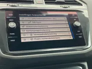 Volkswagen Tiguan 1.4TSIeHybrid 180kW/245PK R-Line Black Style · Panoramadak · Trekhaak · 360°Camera + Parkeersensoren ·