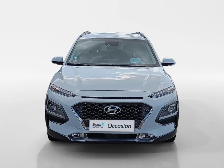 Hyundai Kona 1.6 GDI HEV Premium | Trekhaak | Apple Carplay/Android Auto | Adaptive cruise control | Dodenhoek herkenning | Leren bekleding