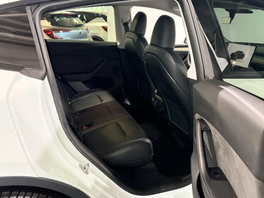 Tesla Model Y 351PK Long Range AWD 75 kWh Automaat | 1e eigenaar | Panoramadak | Basic Autopilot | 360 Camera | Stoelverwarming | Leder | Elektrische Achterklep | Elektrische Stoelen | Full LED |