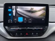 Volkswagen ID.4 Pro Business Advantage 77 kWh 204pk · SOH 94,4% · 360 Camera · Inklap. Trekhaak · Stuur- & Stoelverwarming · Adaptive Cruise Control · Dodehoeksensor · Elek. Achterklep ·
