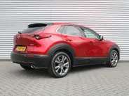 Mazda CX-30 2.0 e-SkyActiv-X M Hybrid Luxury | Trekhaak | Schuifdak | 18' LM | Leer | Elektr. stoelverstelling | Stuur-/stoelverwarming | HUD | 360 Camera | Winterset |