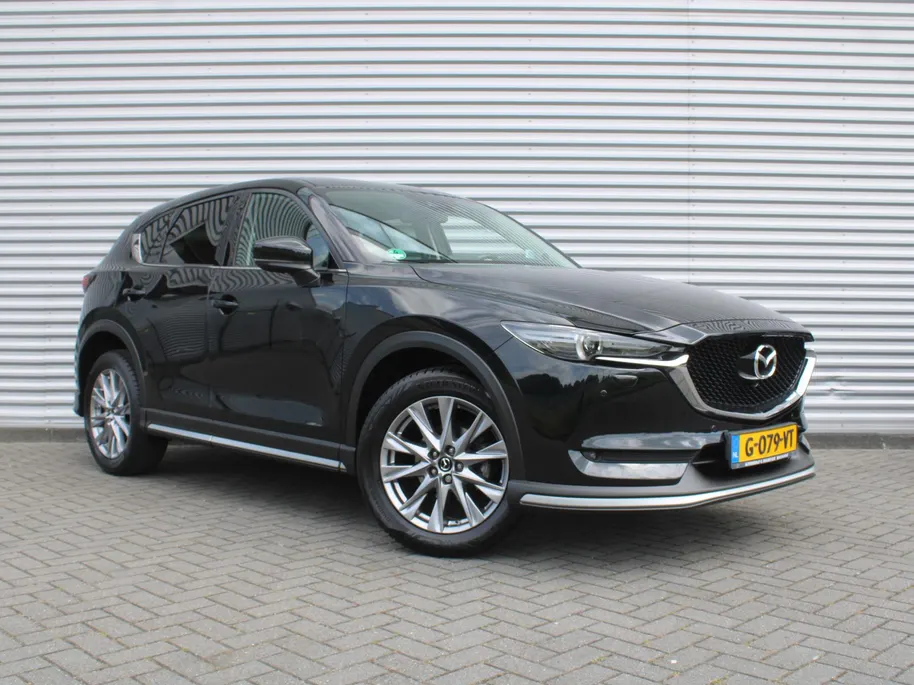 Mazda CX-5 2.0 SkyActiv-G 6AT 165PK Business Luxury | Stuur-/stoelverwarming + ventilatie | Geheugenstoel | 360 Camera | HUD | Leer | 19" LM | Dodehoek detectie | Bose |