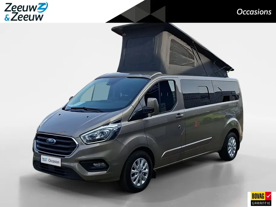 Ford Transit Custom Camper 170pk automaat | Keuken met gootsteen- koelkast- gasfornuis | Zonnescherm | Nieuwe distributieriem | Cruise control | Trekhaak | Extra opbergruimte | Stoelverwarming Transit Custom Camper 170pk automaat | Keuken met gootsteen- koelkast- gasfornuis | Zonnescherm | Nieuwe distributieriem | Cruise control | Trekhaak | Extra opbergruimte | Stoelverwarming