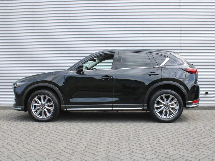 Mazda CX-5 2.0 SkyActiv-G 6AT 165PK Business Luxury | Stuur-/stoelverwarming + ventilatie | Geheugenstoel | 360 Camera | HUD | Leer | 19" LM | Dodehoek detectie | Bose |