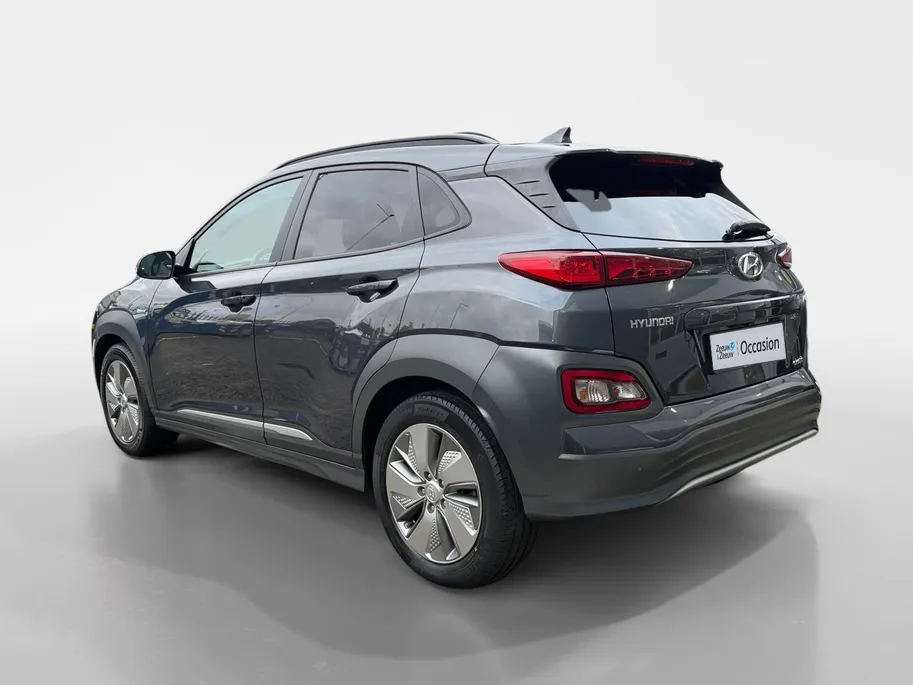 Hyundai Kona EV Fashion 64 kWh | Zeer nette auto | 100 % SOH | Stoelverwarming | Navigatie | Apple CarPlay & Android Auto | Achteruitrijcamera | Dealer onderhouden |