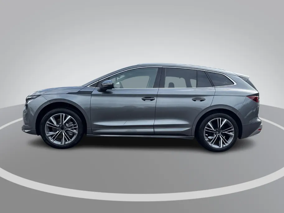 Škoda Enyaq iV Business Edition 85 | 20' inch velgen Neptune | Achterbumper en dorpels in carosseriekleur | Elektrisch wegklapbare trekhaak | 2.500,- inruilpremie!!