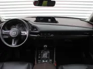 Mazda CX-30 2.0 e-SkyActiv-X M Hybrid Luxury | Trekhaak | Schuifdak | 18' LM | Leer | Elektr. stoelverstelling | Stuur-/stoelverwarming | HUD | 360 Camera | Winterset |
