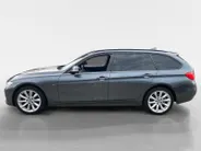 BMW 3 Serie Touring 316i Executive Sport NL Auto | unieke km.stand | navigatie | lm velgen | cruise | etc.