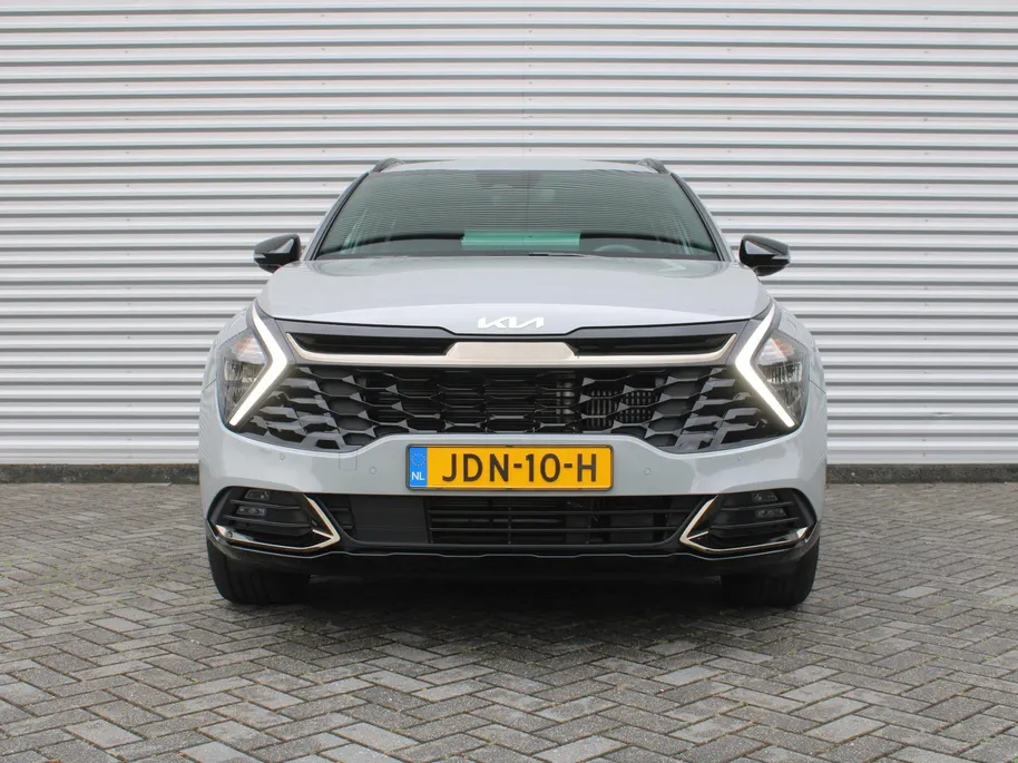 Kia Sportage 1.6 T-GDi Hybrid Dark Edition | Stuur-/stoelverwarming v+a | Camera | Elek. stoelverstelling | 18' LM | Cruise adapt. | Navi | Clima | Half leer/suède |