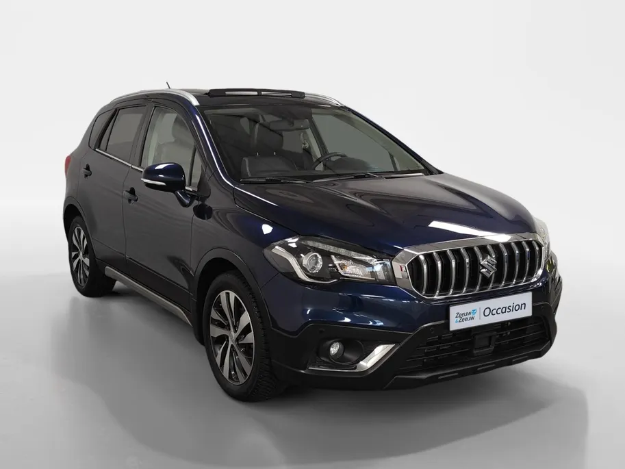 Suzuki S-Cross 1.4 Boosterjet Stijl AUTOMAAT NAVI AIRCO CAMERA ADAPTIEVE CRUISE CONTROLE APPLE CARPLAY ANDROID AUTO SCHUIFKANTELDAK LEER ZEER MOOIE AUTO DEALER ONDERHOUDEN