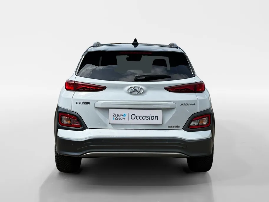 Hyundai Kona EV Premium 64 kWh | Achteruitrijcamera | Head Up Display | Dodehoek Detectie | Lederen Bekleding | Climate Control |