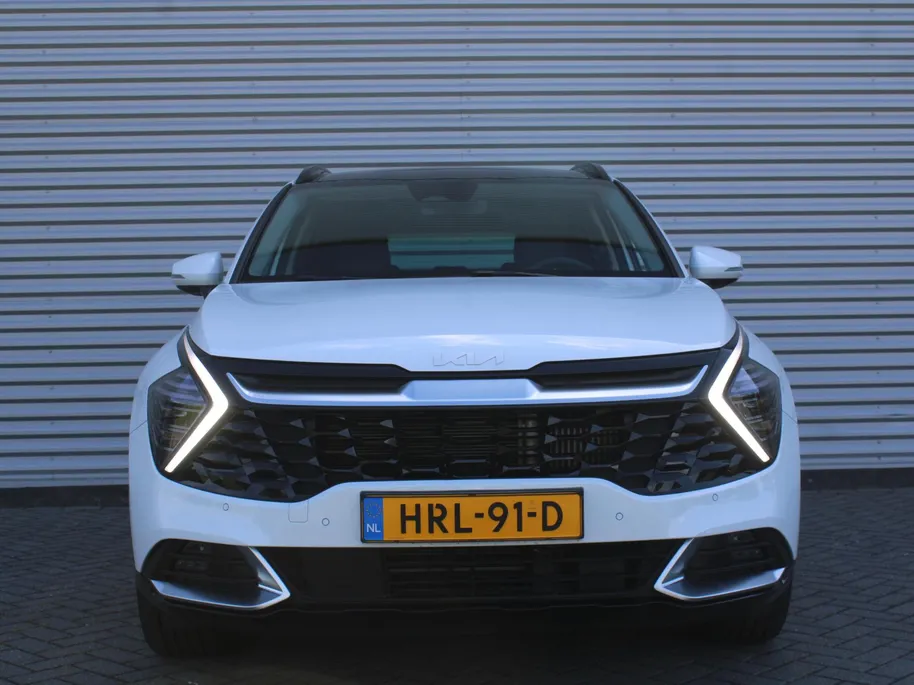 Kia Sportage 1.6 T-GDi Hybrid DynamicPlusLine | Stuur-/stoelverwarming | Elek. stoelverstelling + achterklep | Schuifdak | 18' LM | Matrix LED | Cruise adapt. | Camera |